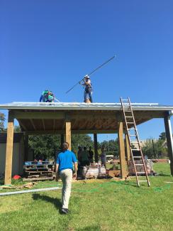 men installing solar panels